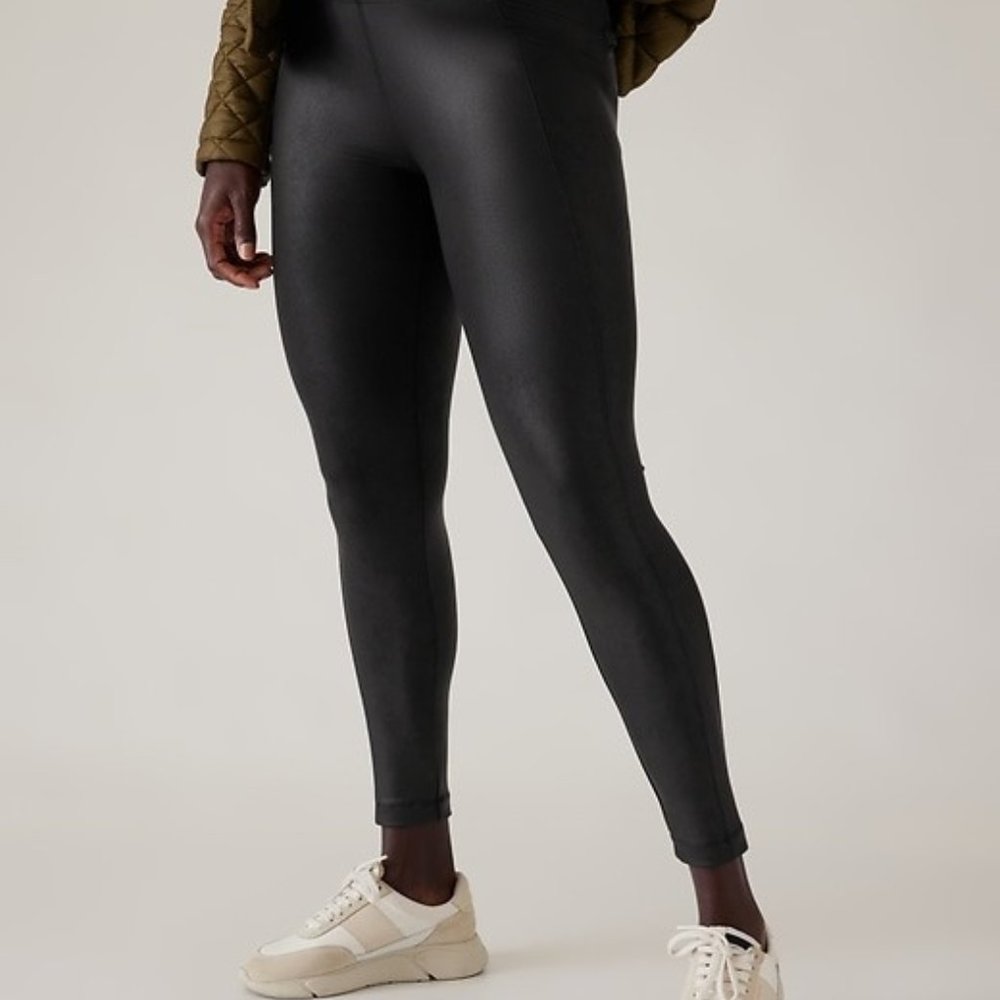 Athleta Delancy Gleam Tight in black.  Size M (runs large)